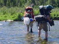 hiking sandal crossing stream