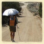 desert hiking with sun umbrella